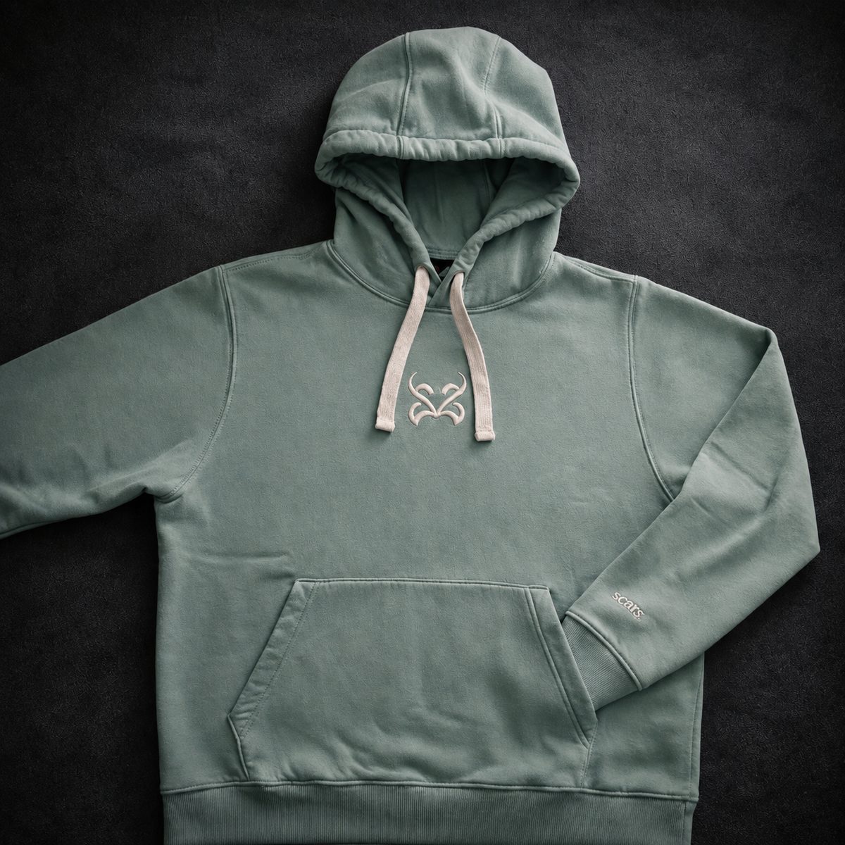 SCARS Emblem Hoodie in sage — embroidered emblem, heavyweight streetwear hoodie from Athens