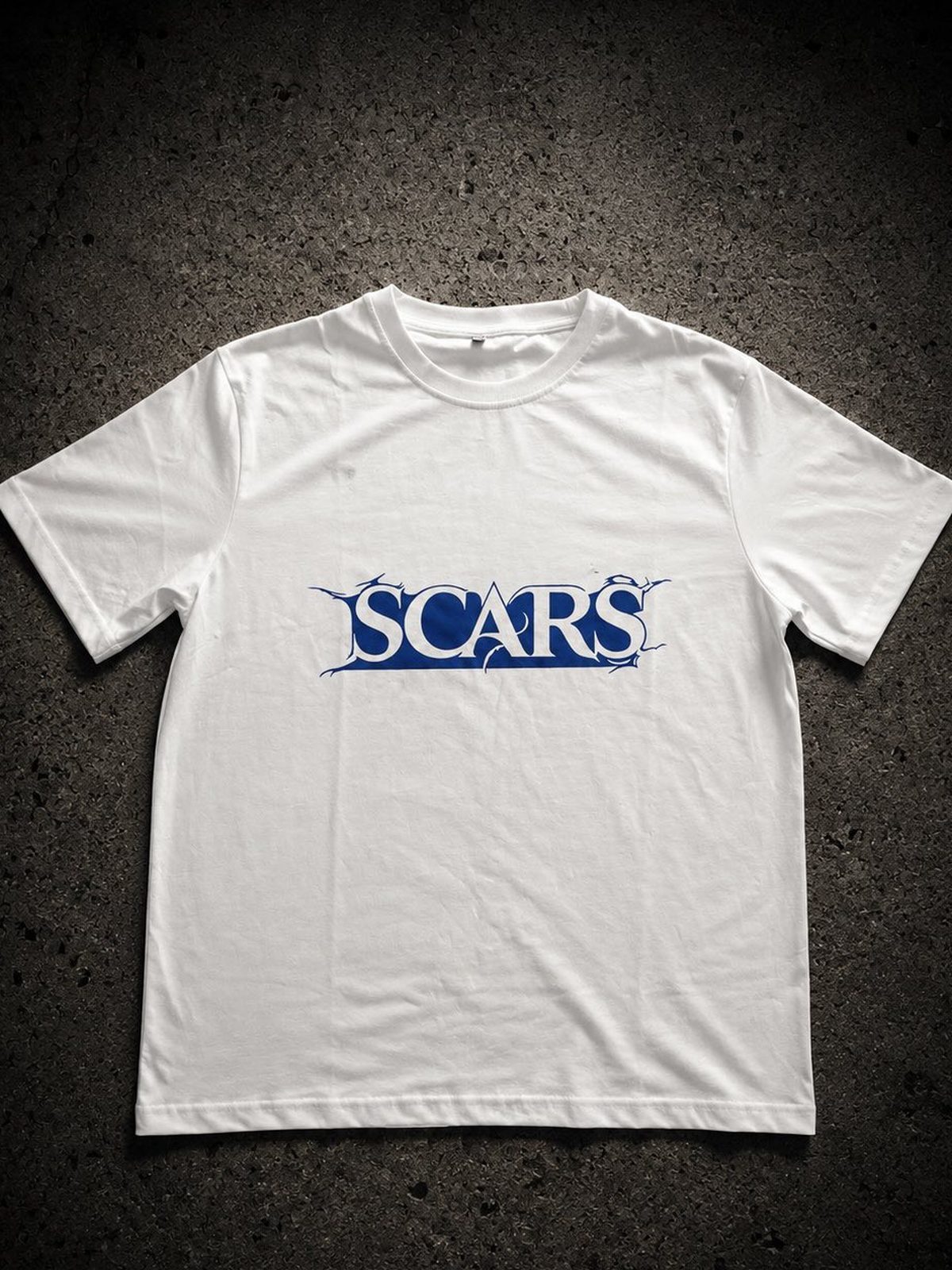 SCARS Thorn Logo Tee — white T-shirt with royal blue thorn wordmark, Athens streetwear